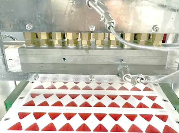How is production efficiency of gummy making machine
